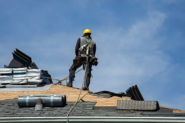 Professional Gutter Installation technician working in Berry, KY